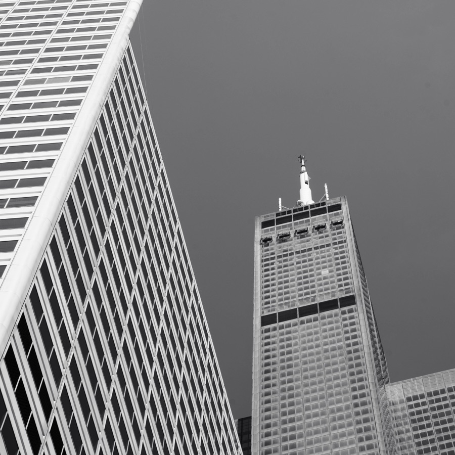Looking up at Chicago skyscrapers in black and white