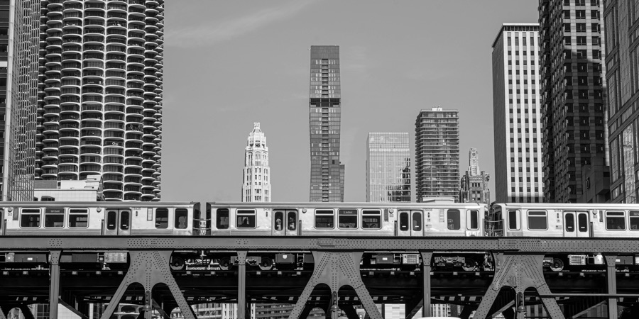 An elevated train crossing the Chicago skyline
